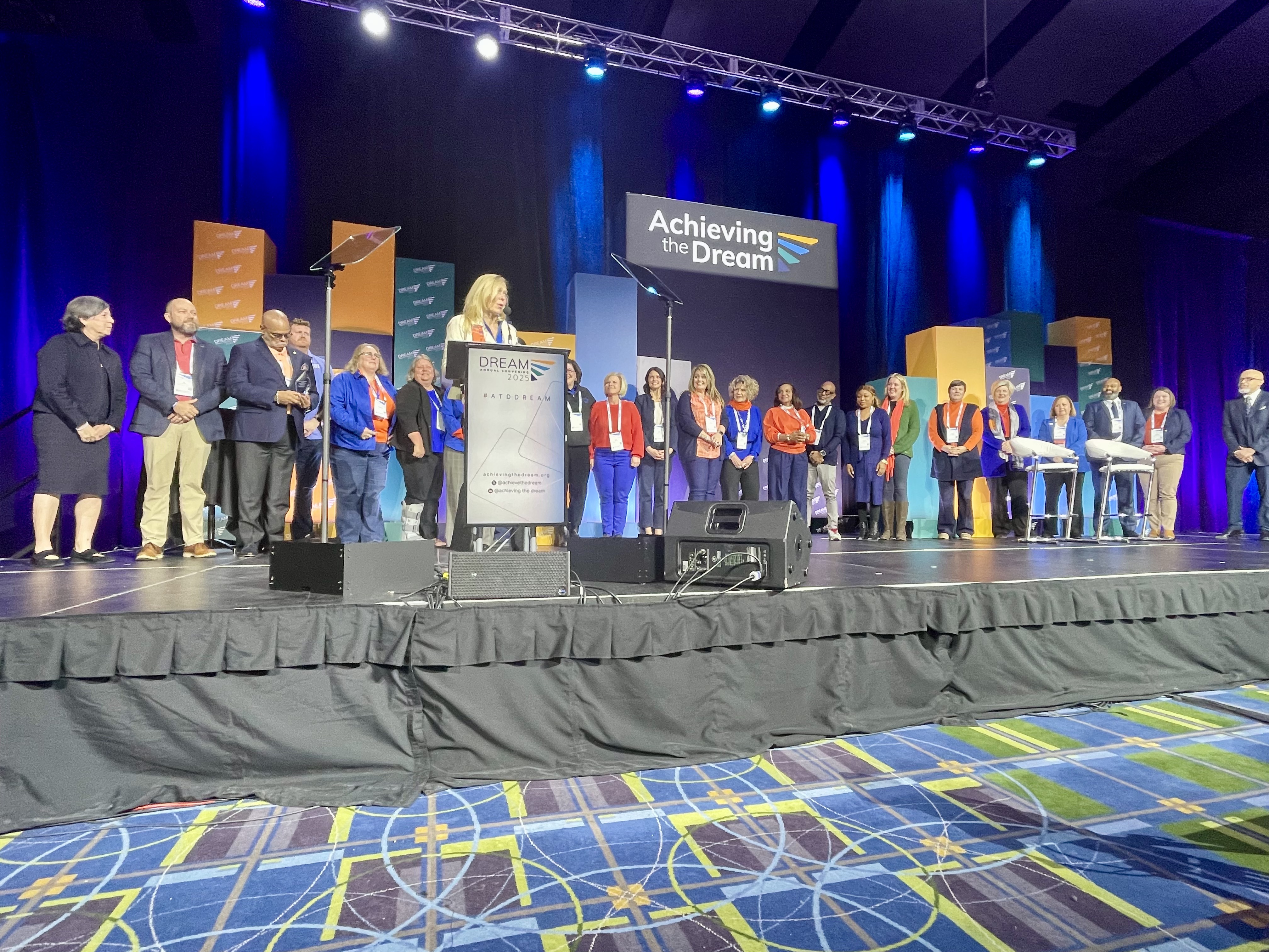 ChattState leadership looks on while Dr. Rebecca Ashford speaks at an Achieving the Dream conference in 2025.