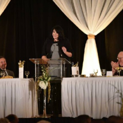 Scholar Amanda Griffin speaking at Dinner of Firsts