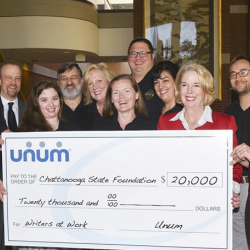 Unum leaders present Check in amt of $20,000 to Dr. Flora Tydings and writers@work faculty