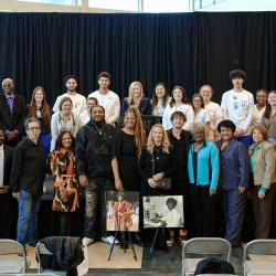 ChattState employees & nursing students stand with photos of Ernestine Carter.