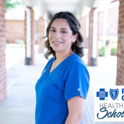 Monserat “Monse” Rincon in blue scrubs. Monserat “Monse” Rincon in blue scrubs.