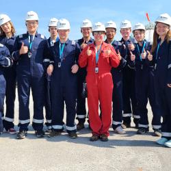 student group in uniforms and hardhats