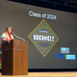 Kisha Thomas, Director of Recruiting & Orientation, speaks during the Harambee ceremony. Kisha Thomas, Director of Recruiting & Orientation, speaks during the Harambee ceremony.