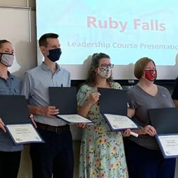 group of people with certificates