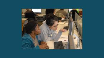 senior citizen working on a computer