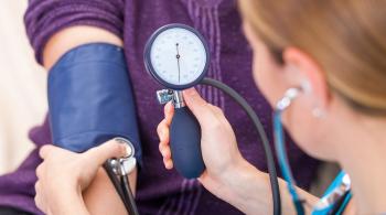 taking blood pressure