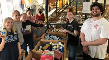 grouo of students inside food bank