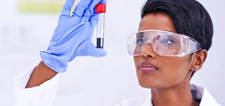 teacher and student in science lab